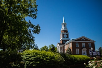 a church with a steeple and a clock tower