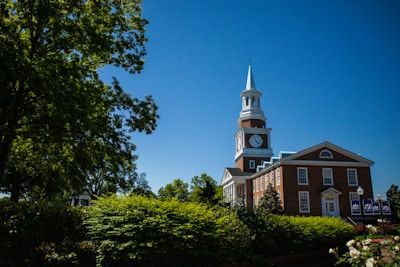 a church with a steeple and a clock tower