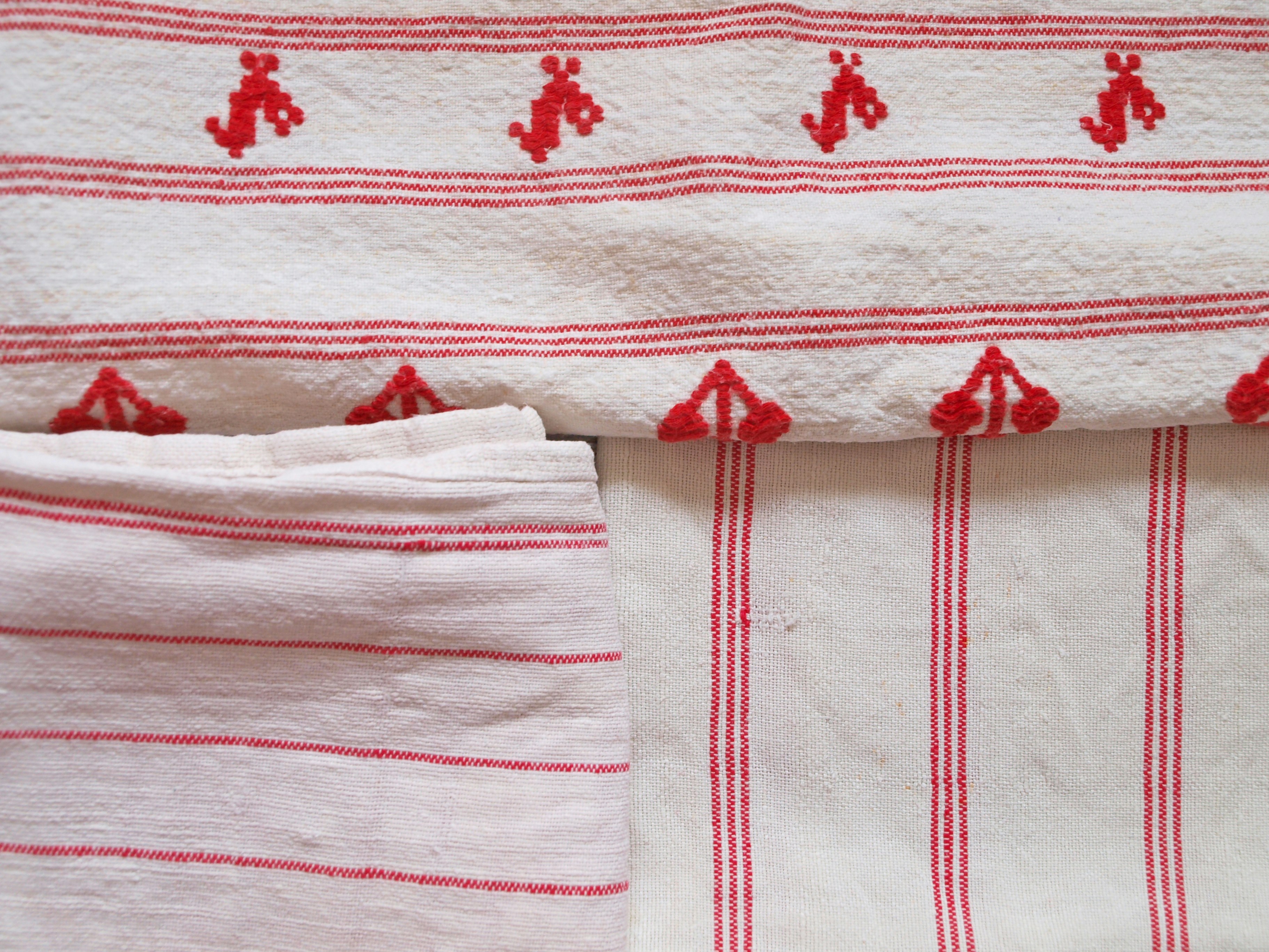 a close up of two towels on a bed