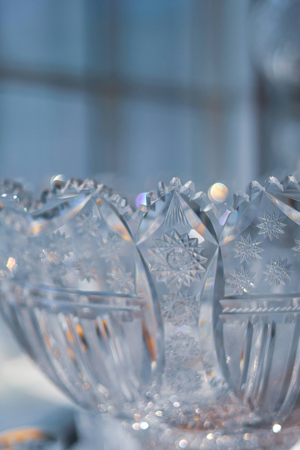 a close up of a glass bowl with snowflakes on it