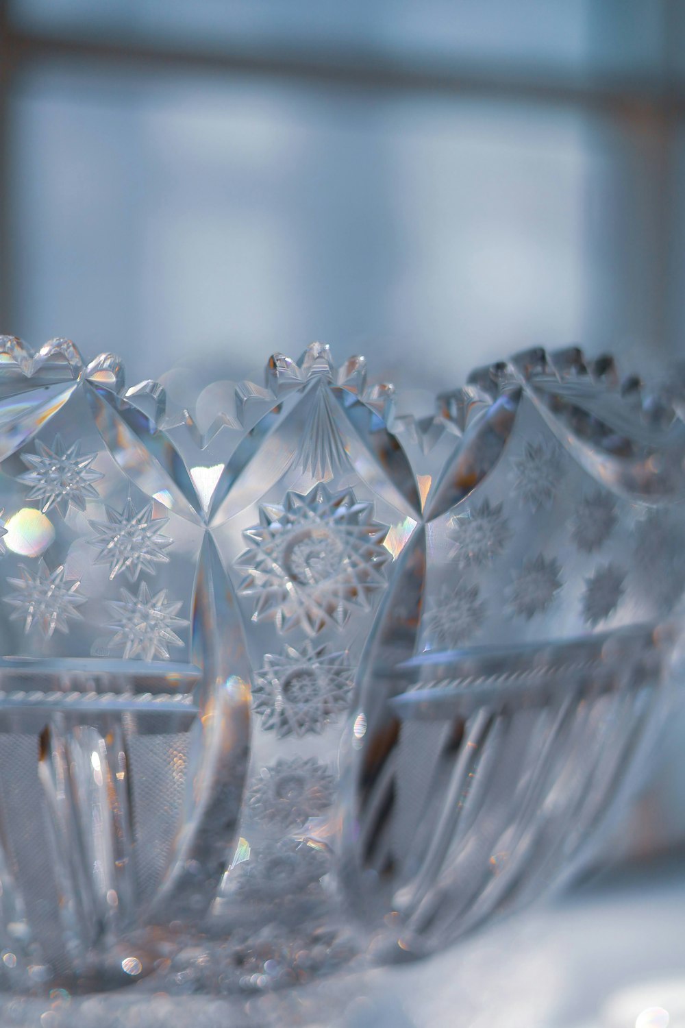 a clear glass bowl with snowflakes on it