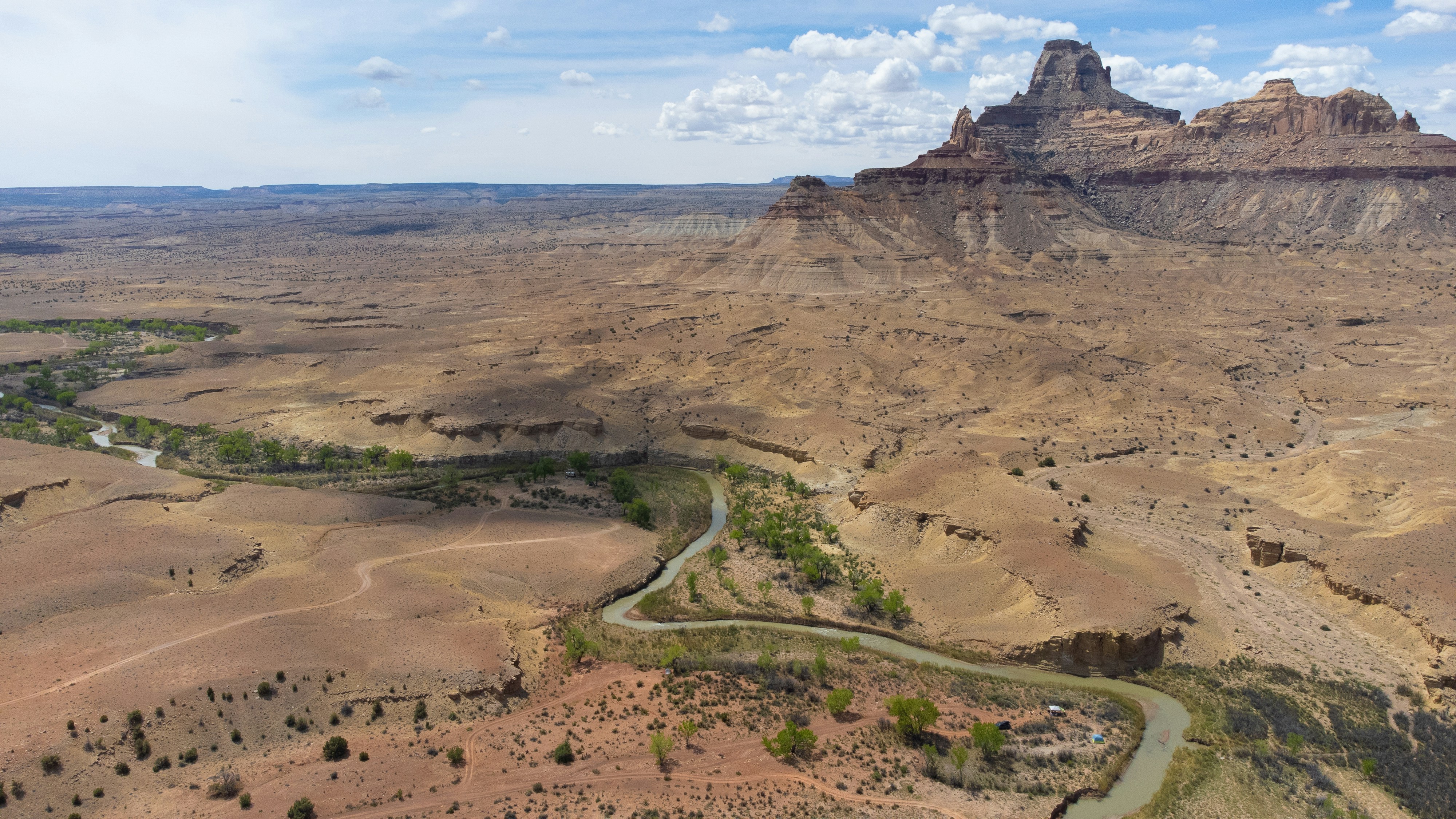 an aerial view of a canyon with a river running through it