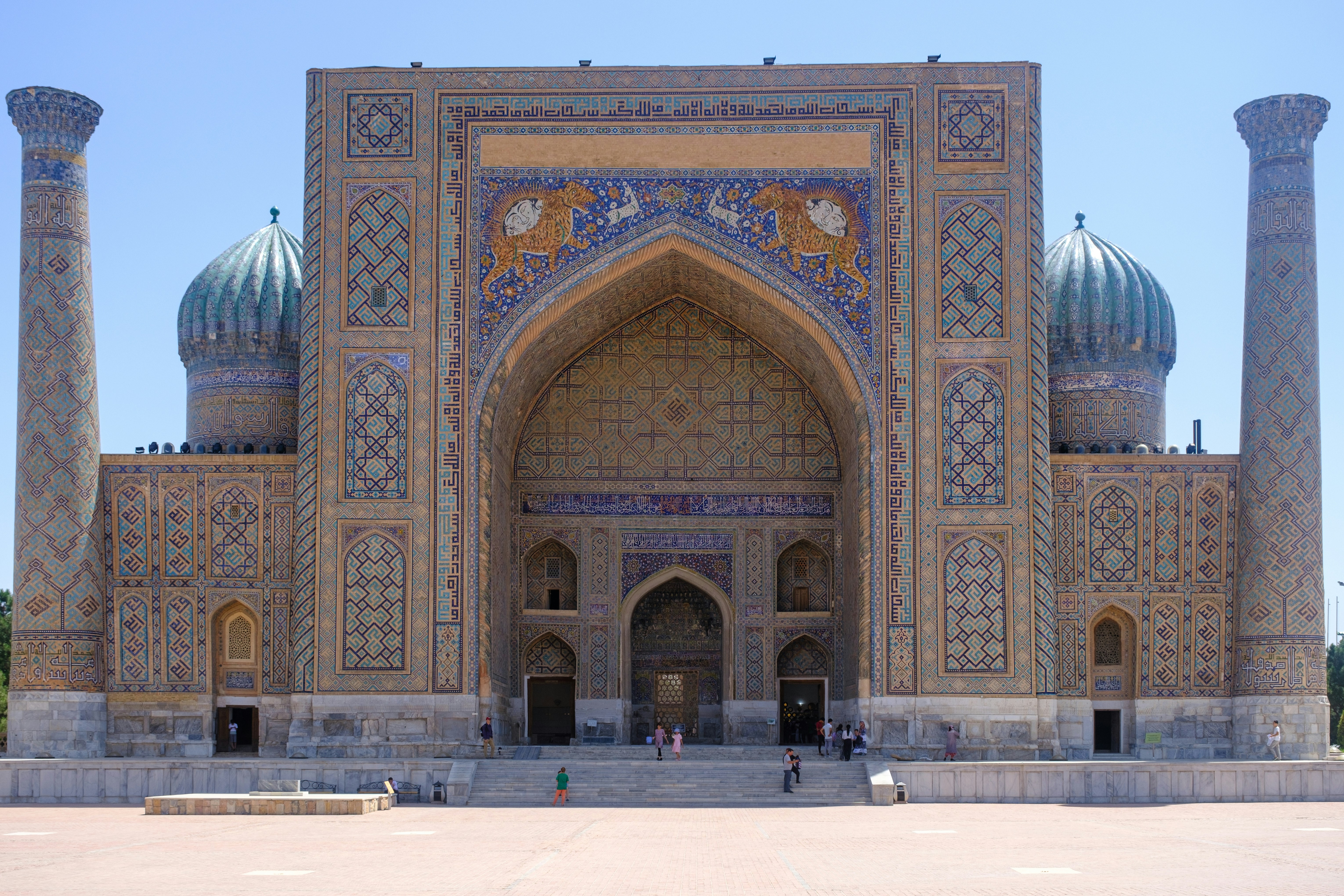 a large building with many pillars and arches