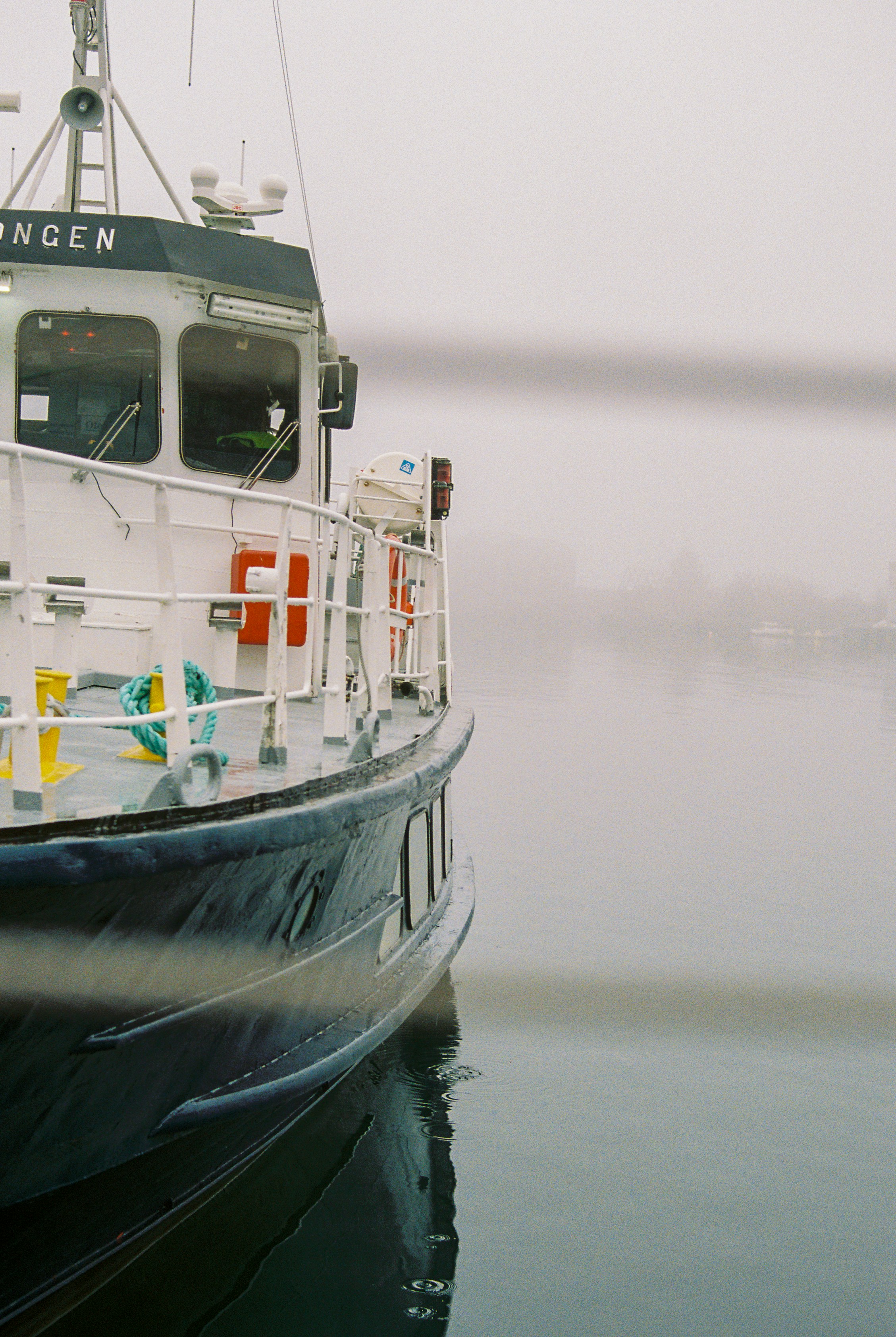 a large boat floating on top of a body of water