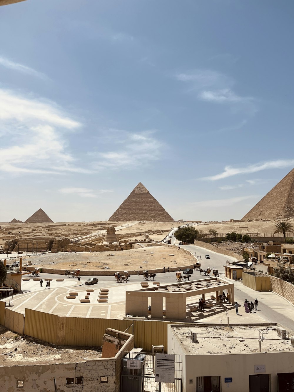 the pyramids of giza are in the distance