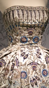 the back of a dress on display in a museum
