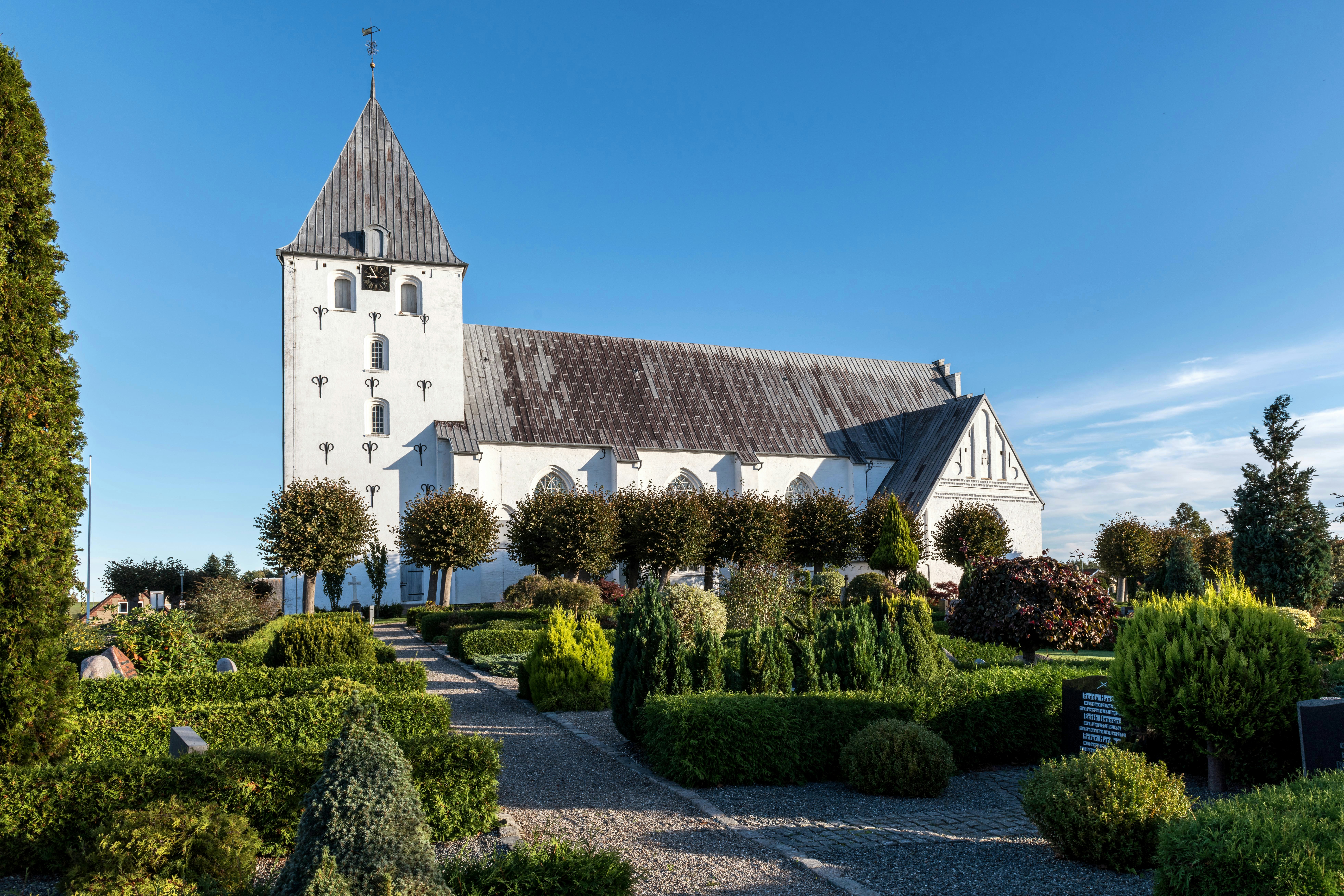 a large white church with a tall tower