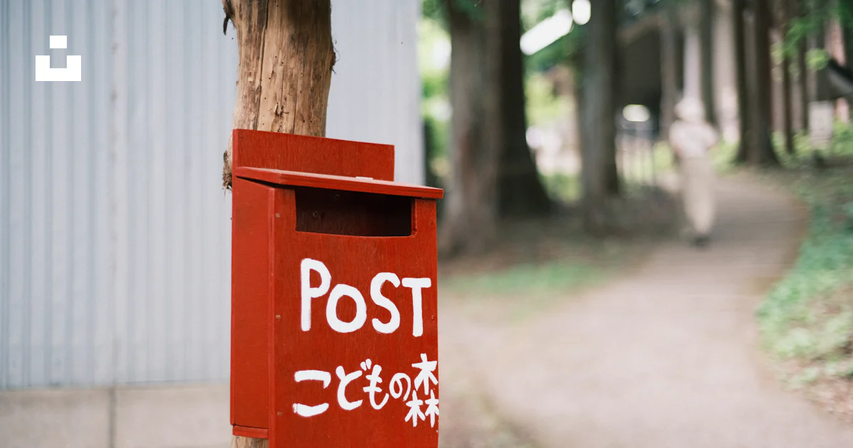 post Images High Quality Grahic A red post with a sign that says post photo – Free Aomori Image on Unsplash