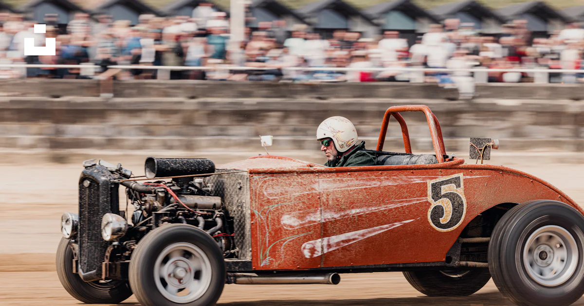 Rod Car Dirt Racing A man driving a red race car on a dirt track photo – Free Hot rod Image ...