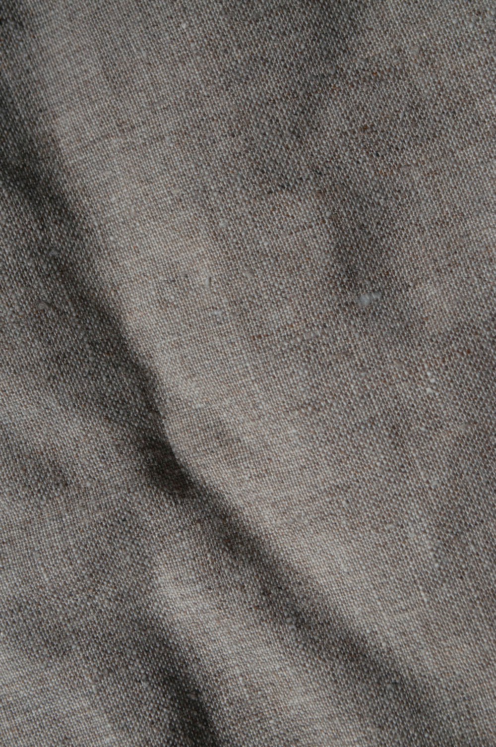 a close up view of a gray fabric