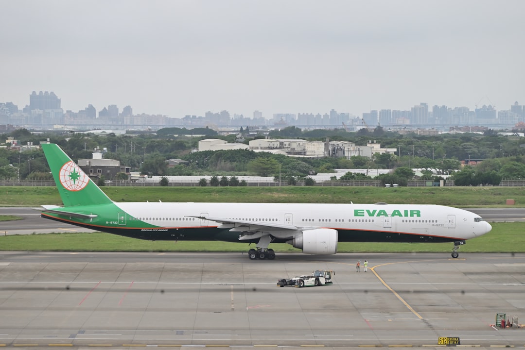a large jetliner sitting on top of an airport tarmac,