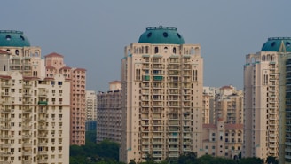 a group of tall buildings in a city