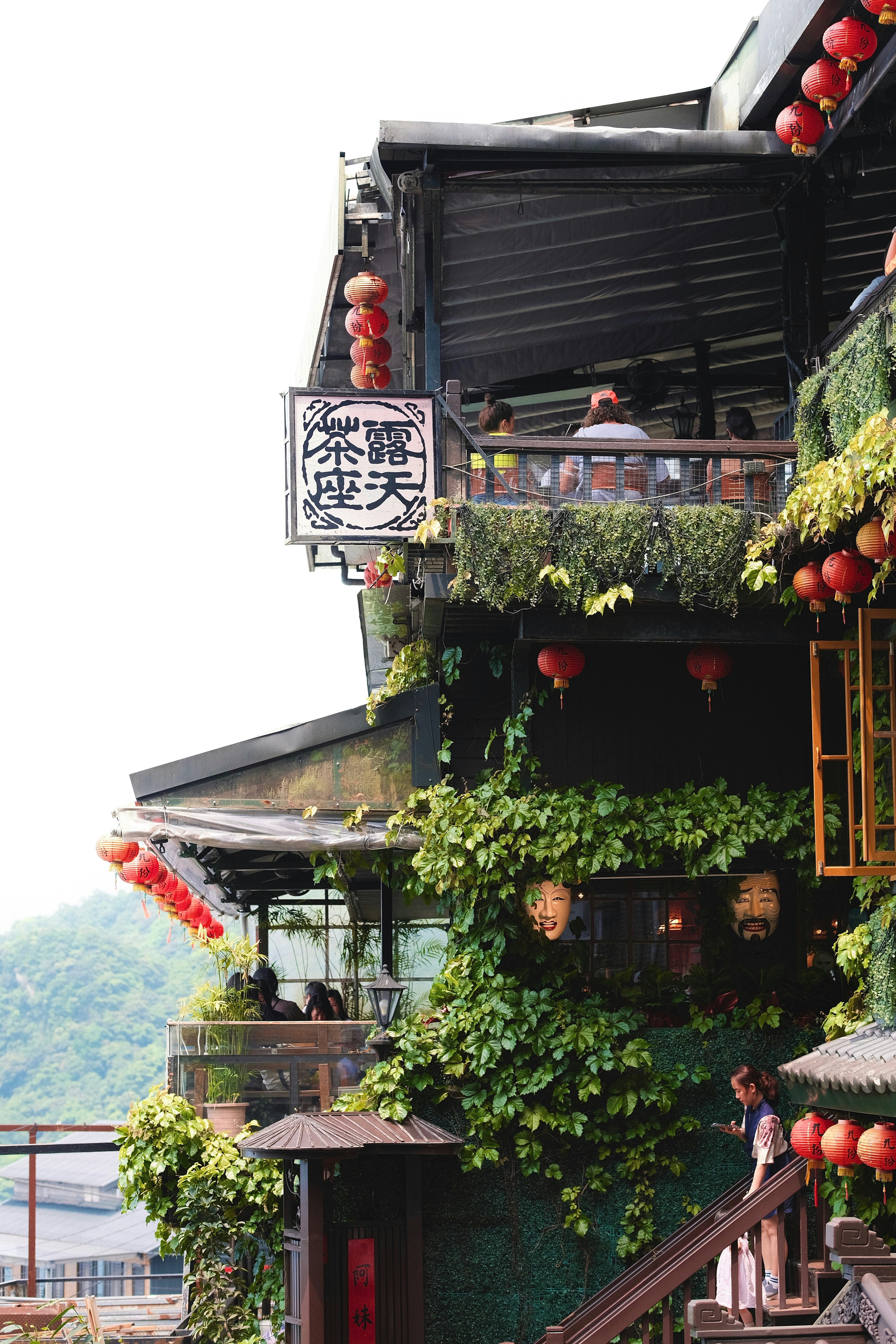 a group of people standing outside of a building