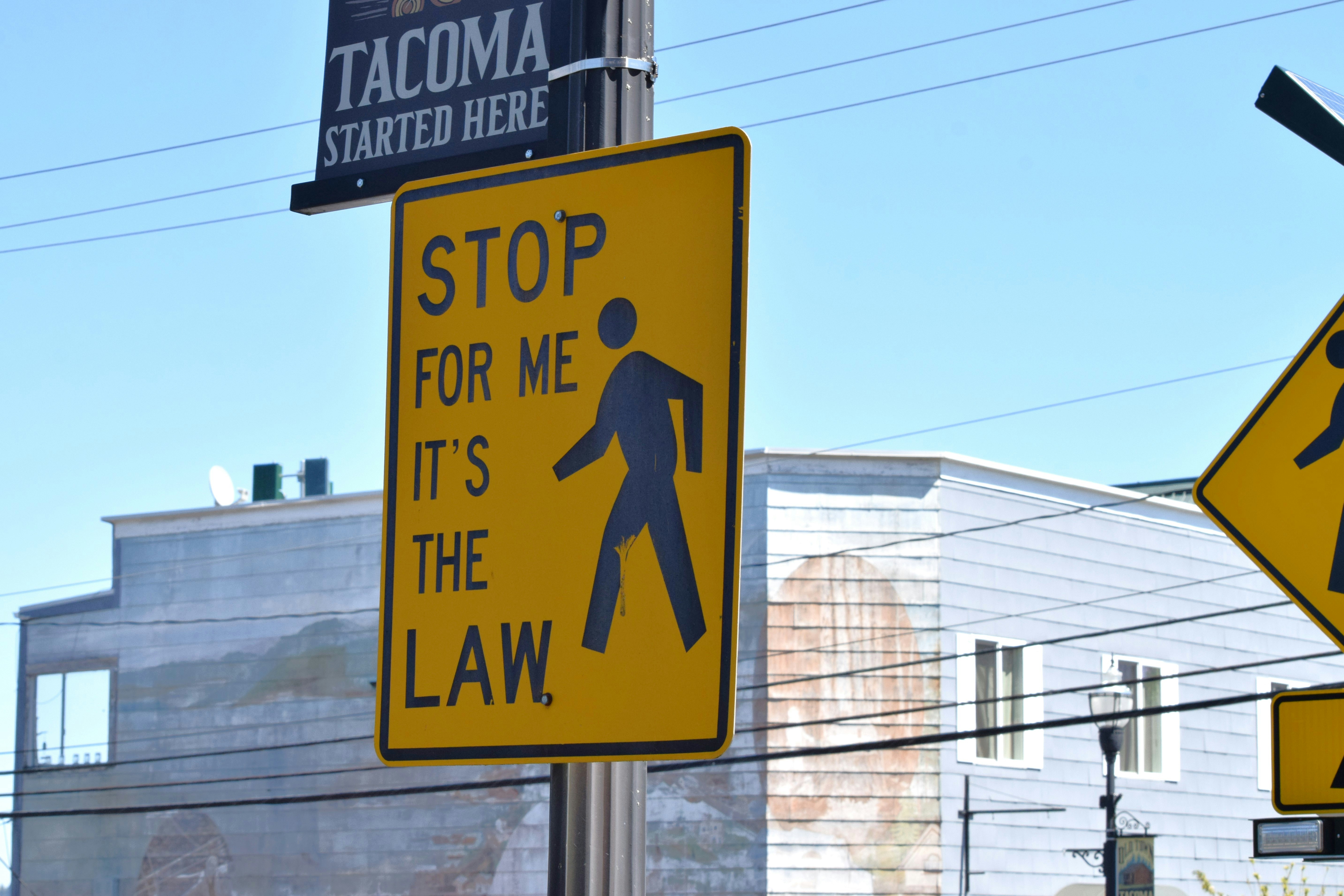 a couple of street signs that are on a pole
