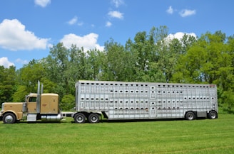 a large truck is parked in a field