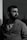 a black and white photo of a man with a beard