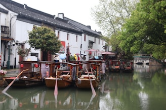 a couple of boats that are sitting in the water