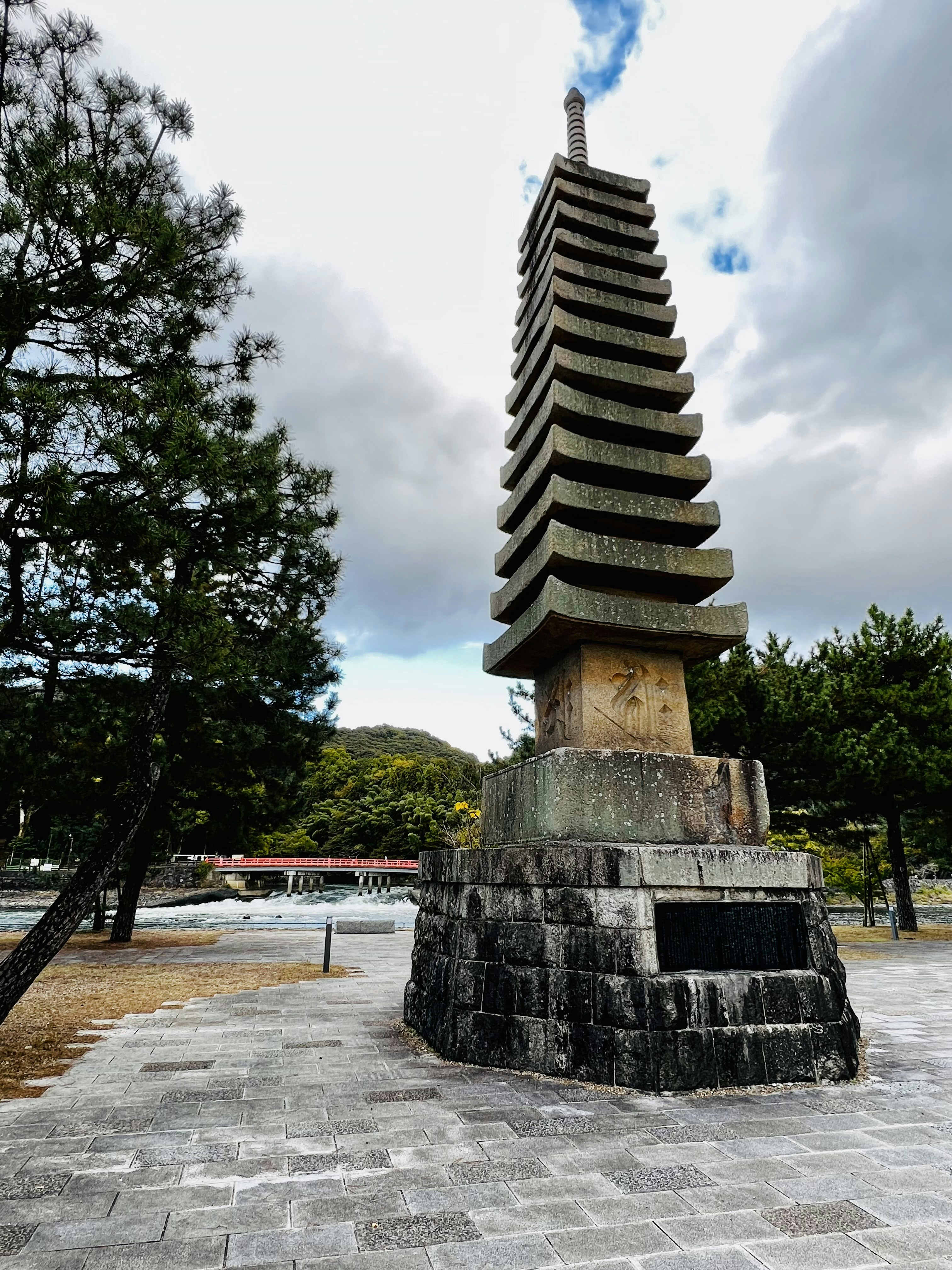 a very tall tower with a sky in the background