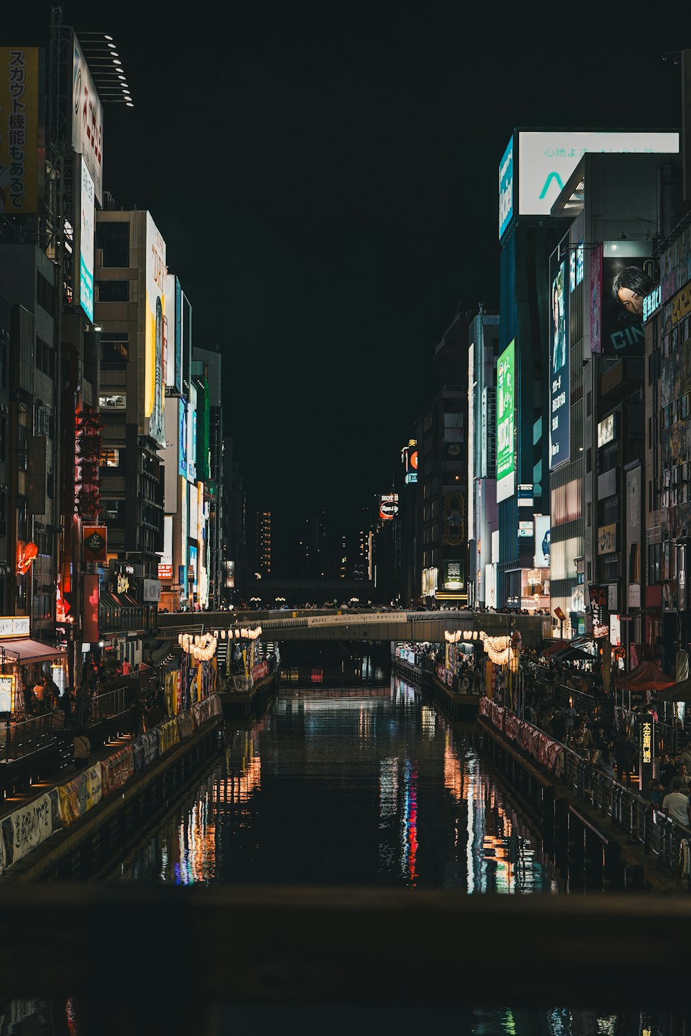 a river running through a city at night