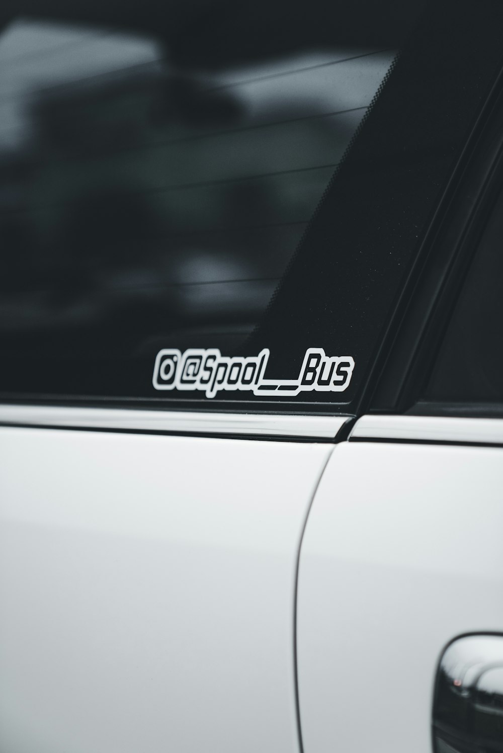 a close up of a car with a sticker on it