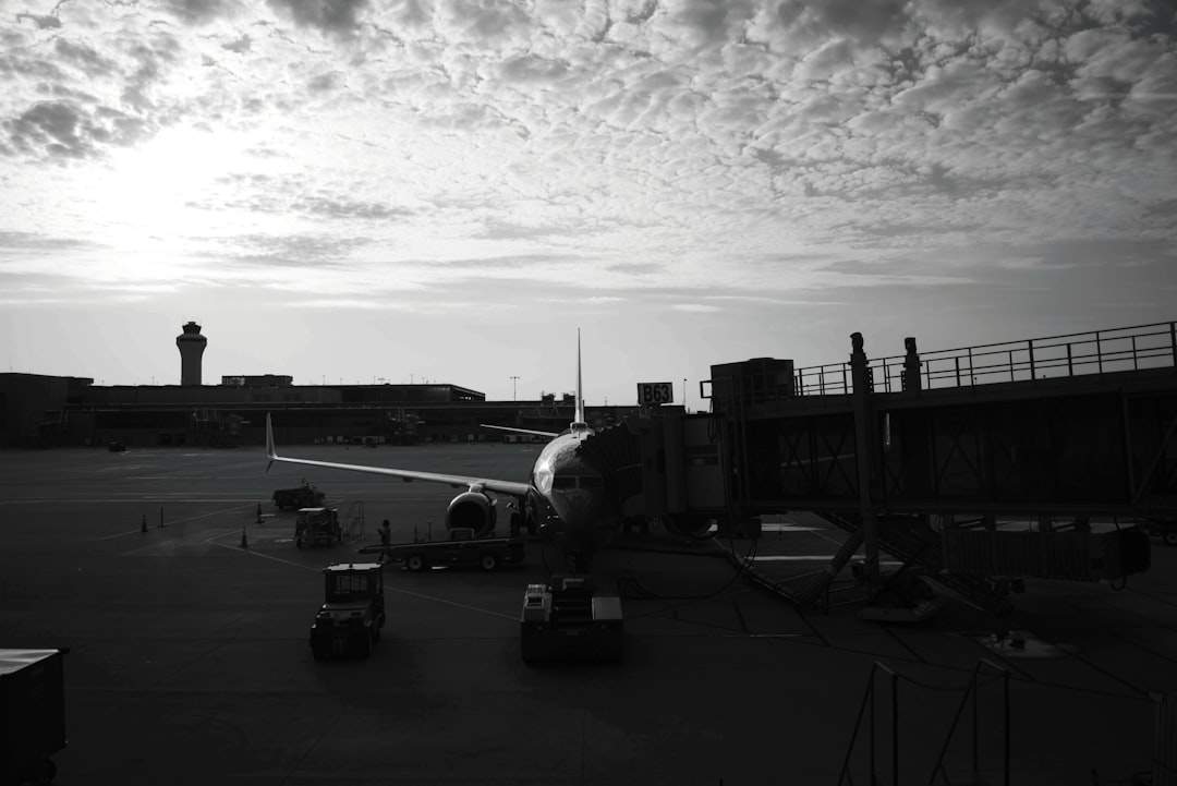 a large jetliner sitting on top of an airport tarmac,
