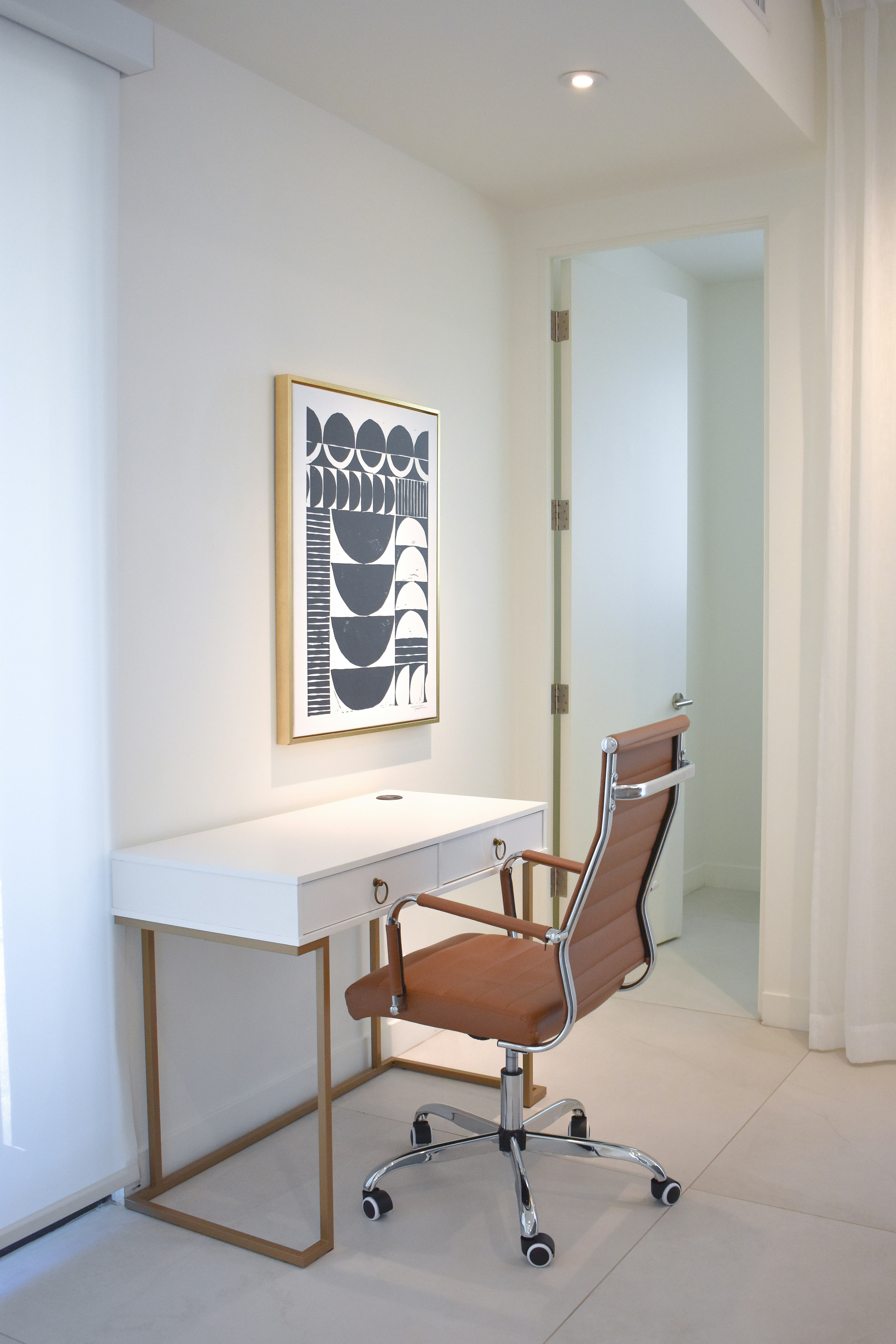 a chair and a desk in a room