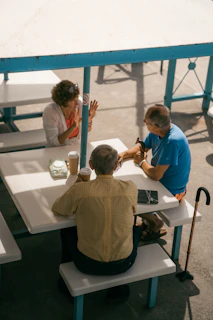 a group of people sitting at a table