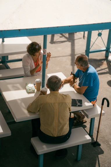 a group of people sitting at a table