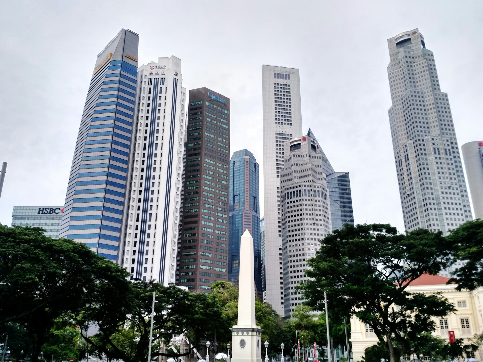 a group of tall buildings in a city