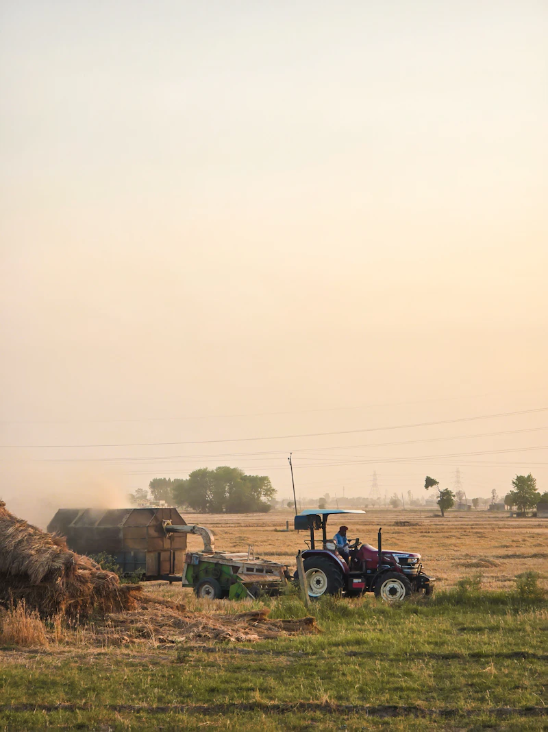 Tractor and trailer in the field