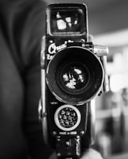 a black and white photo of a camera
