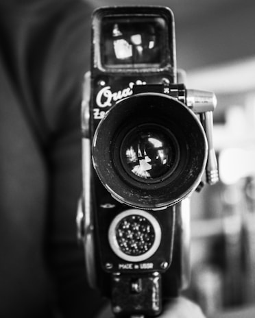 a black and white photo of a camera