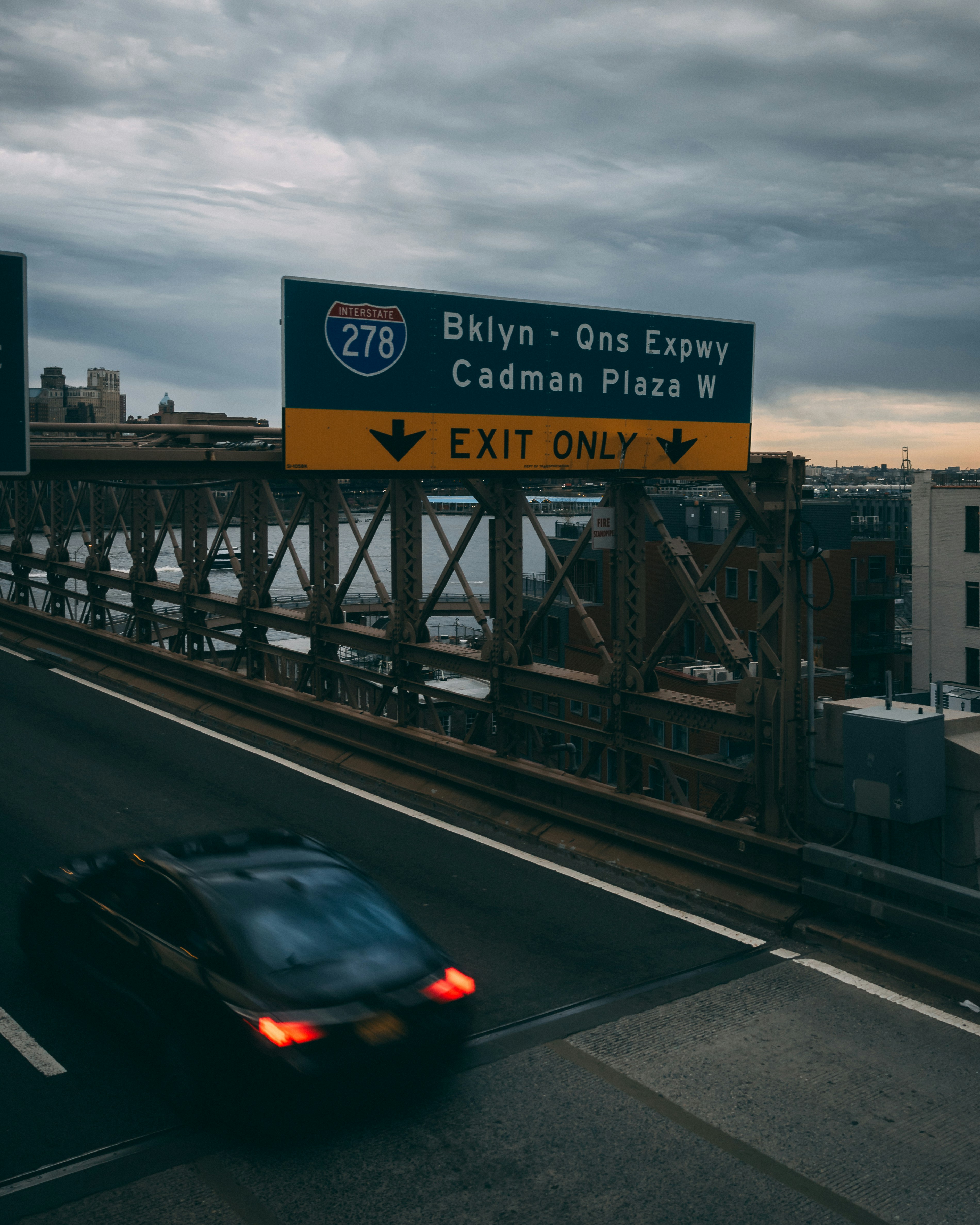 Information board with FAQs about car shipping