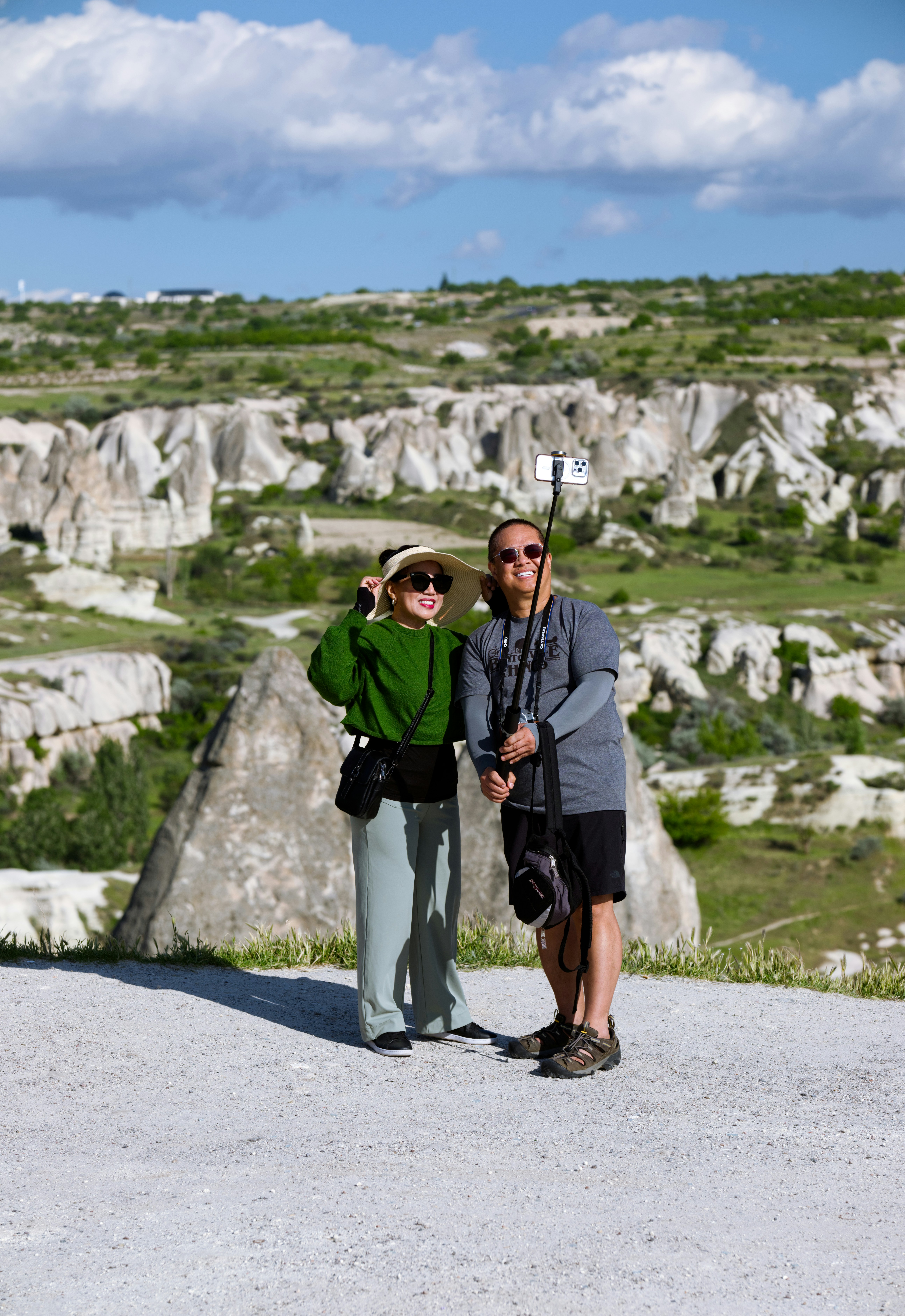 a man and a woman taking a picture of themselves