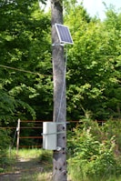 a solar panel attached to a telephone pole