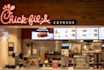 a fast food restaurant with a large menu