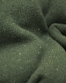 a close up view of a green fabric