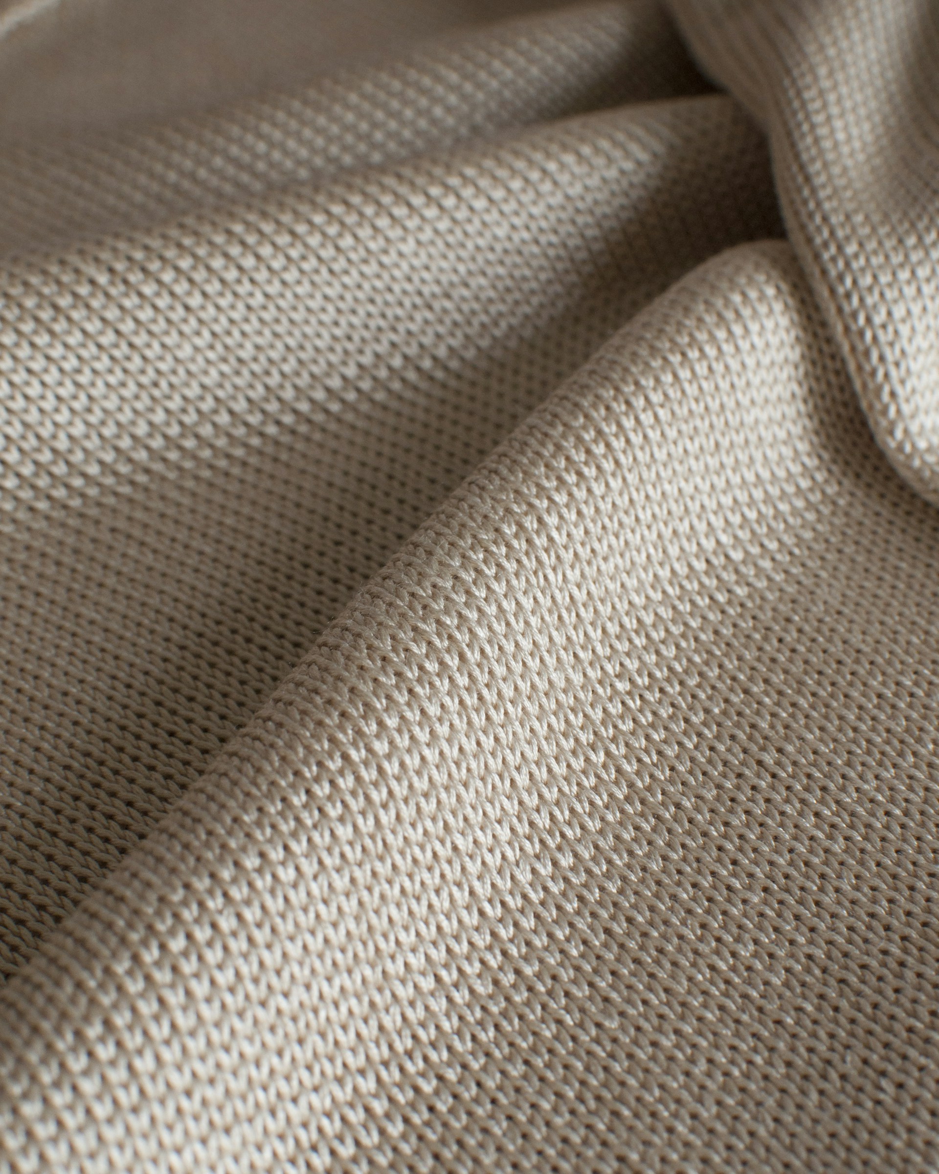 a close up view of a white fabric