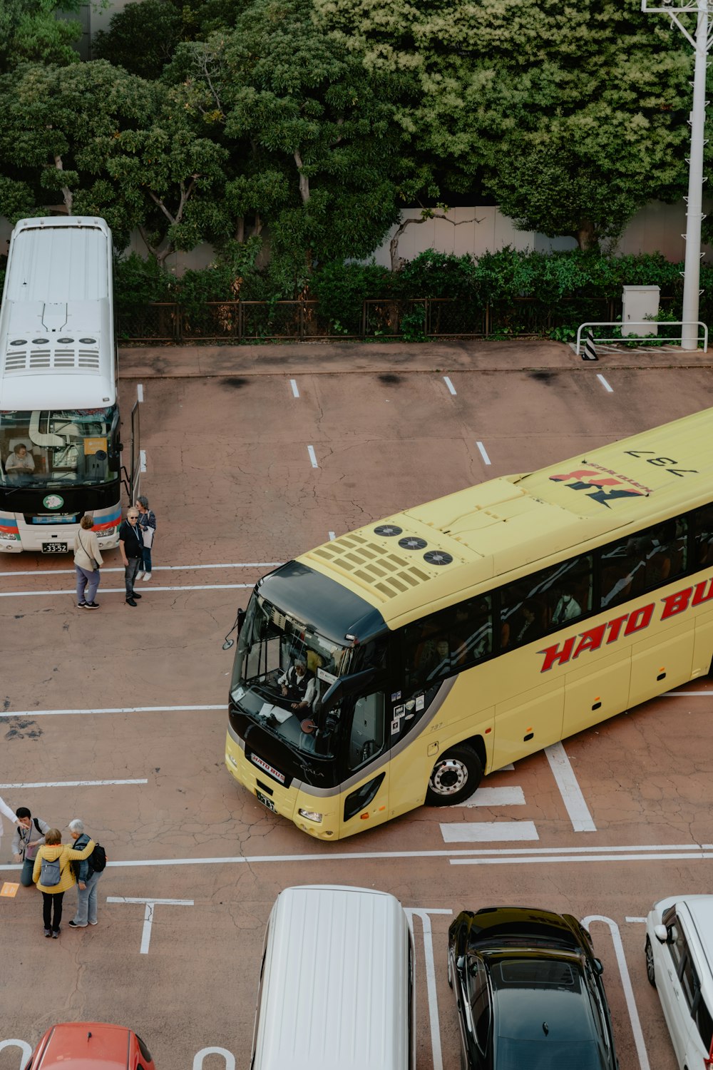 a yellow bus parked in a parking lot