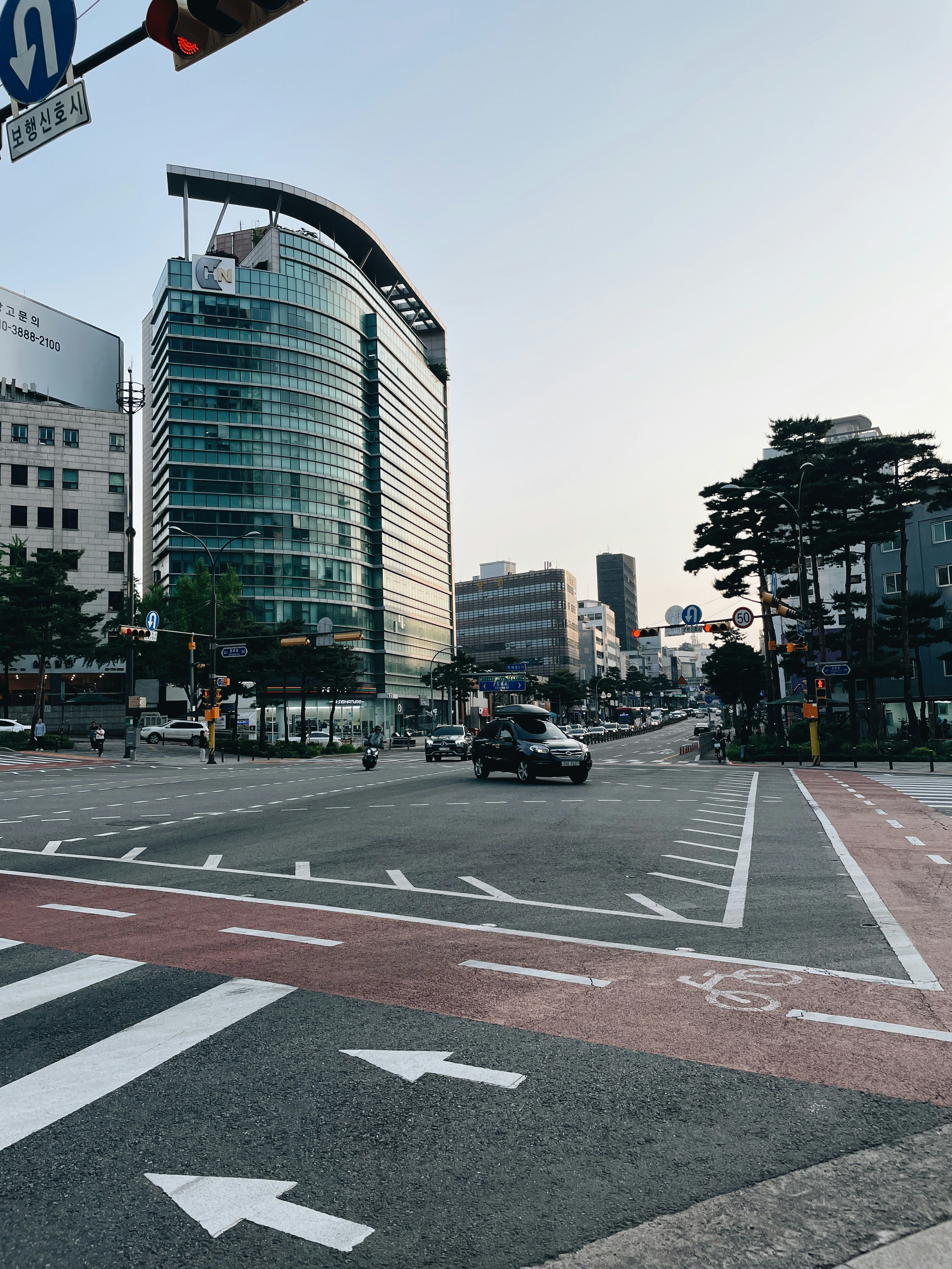 a city street with a lot of tall buildings