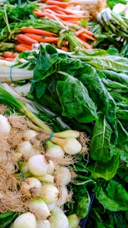 a bunch of vegetables that are on a table