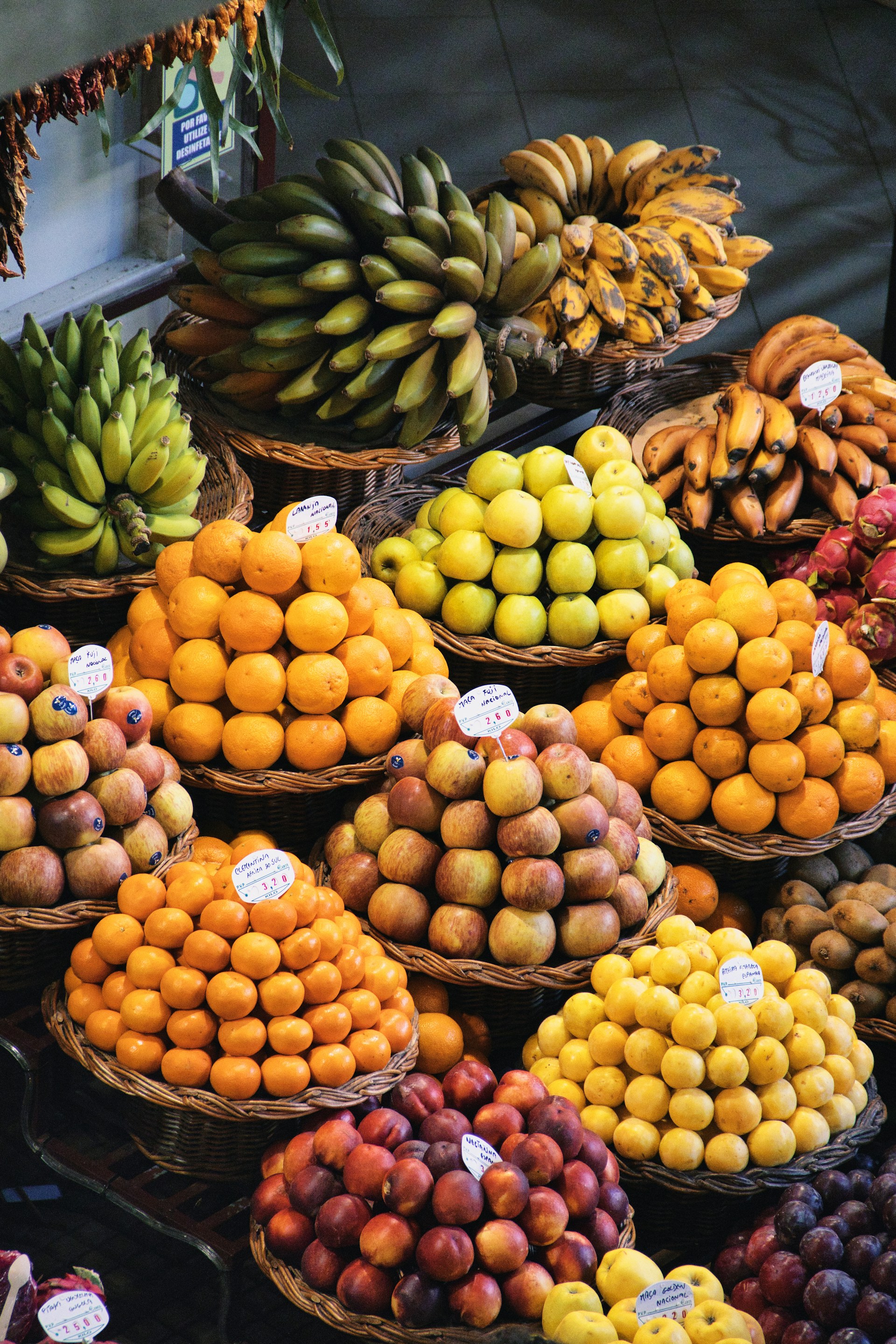 baskets of fruit are stacked on top of each other