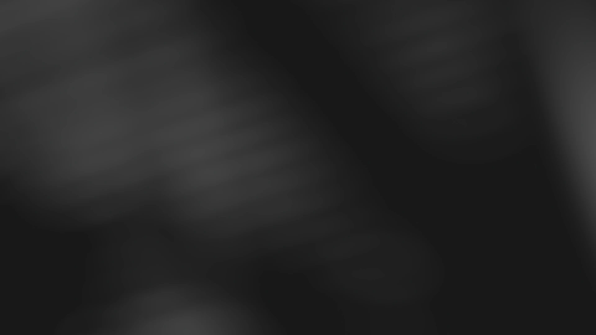 a blurry photo of a black and white background