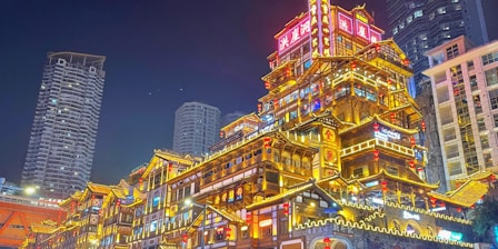 a very tall building with a lot of lights on it