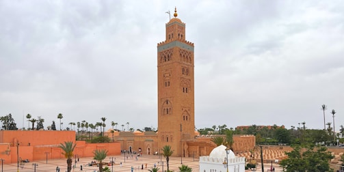 a tall clock tower towering over a city