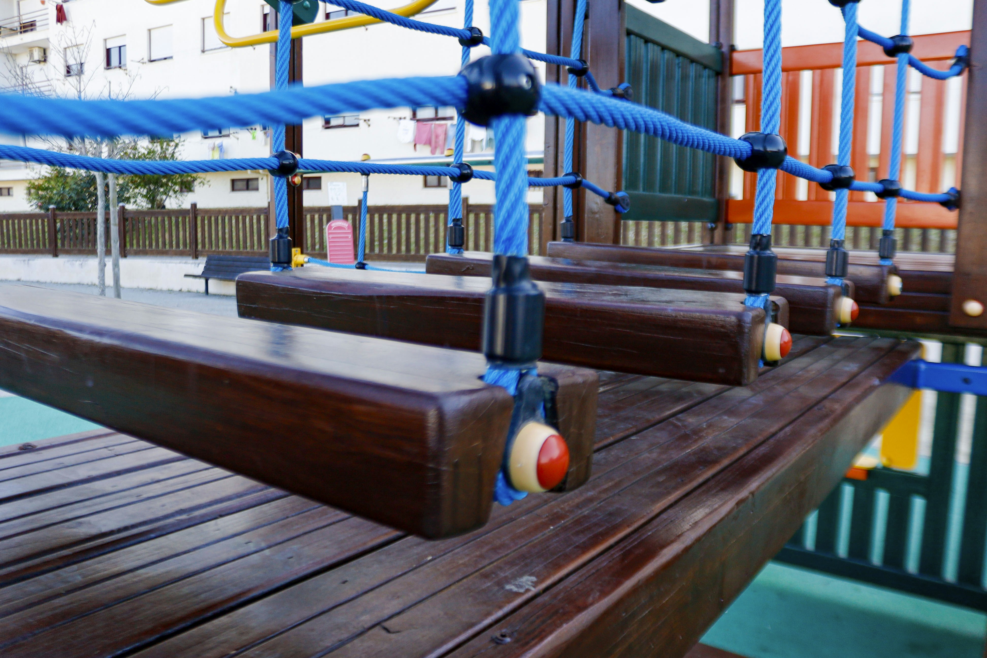 Wooden bench with ropes