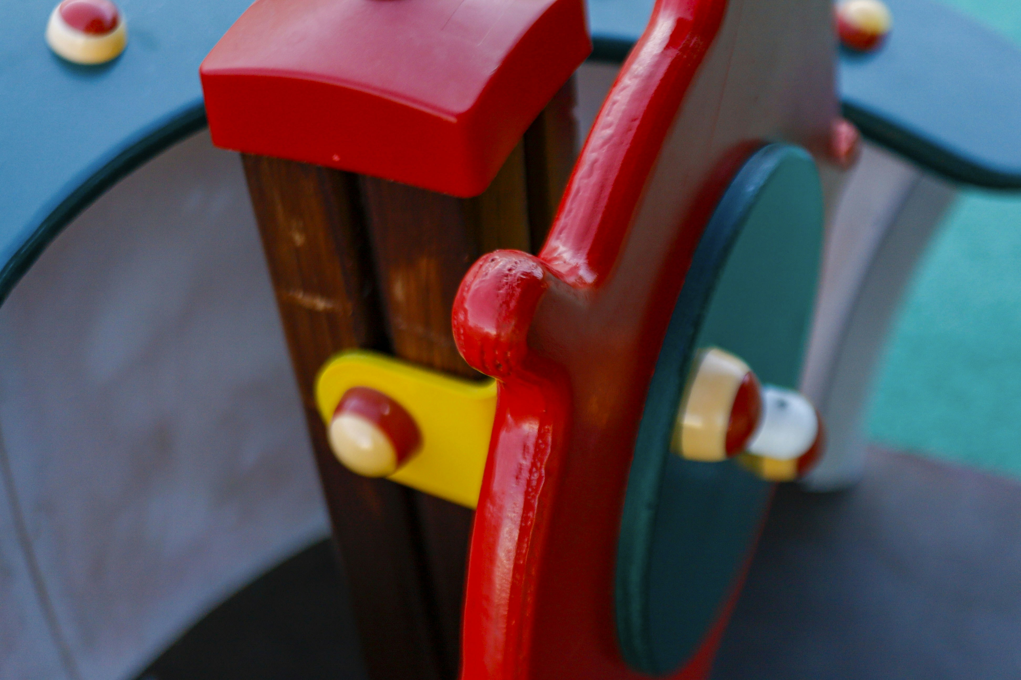a close up of a colorful playground slide