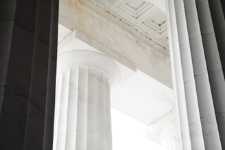 a close up of a column with a sky in the background