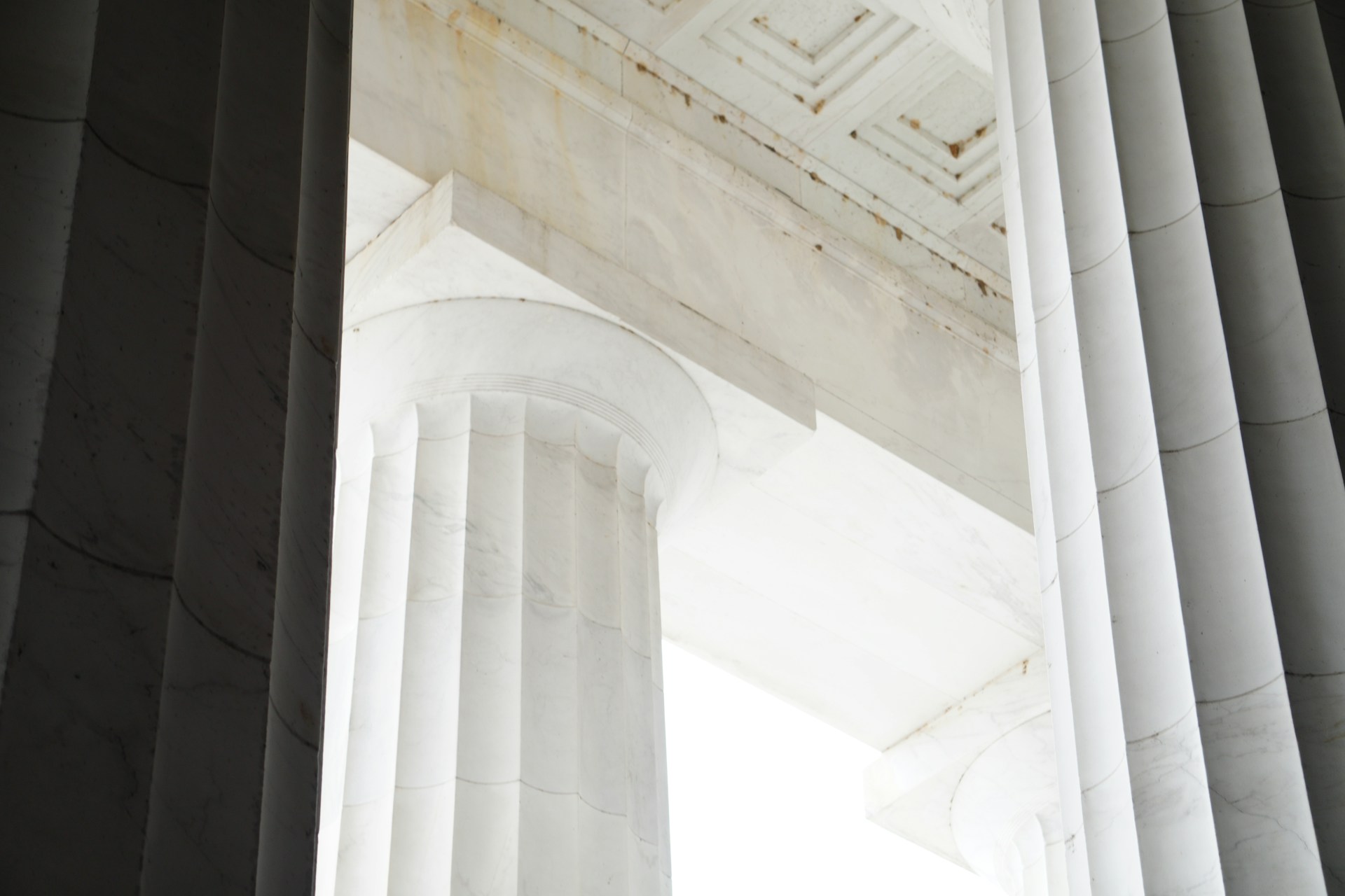 a close up of a column with a sky in the background