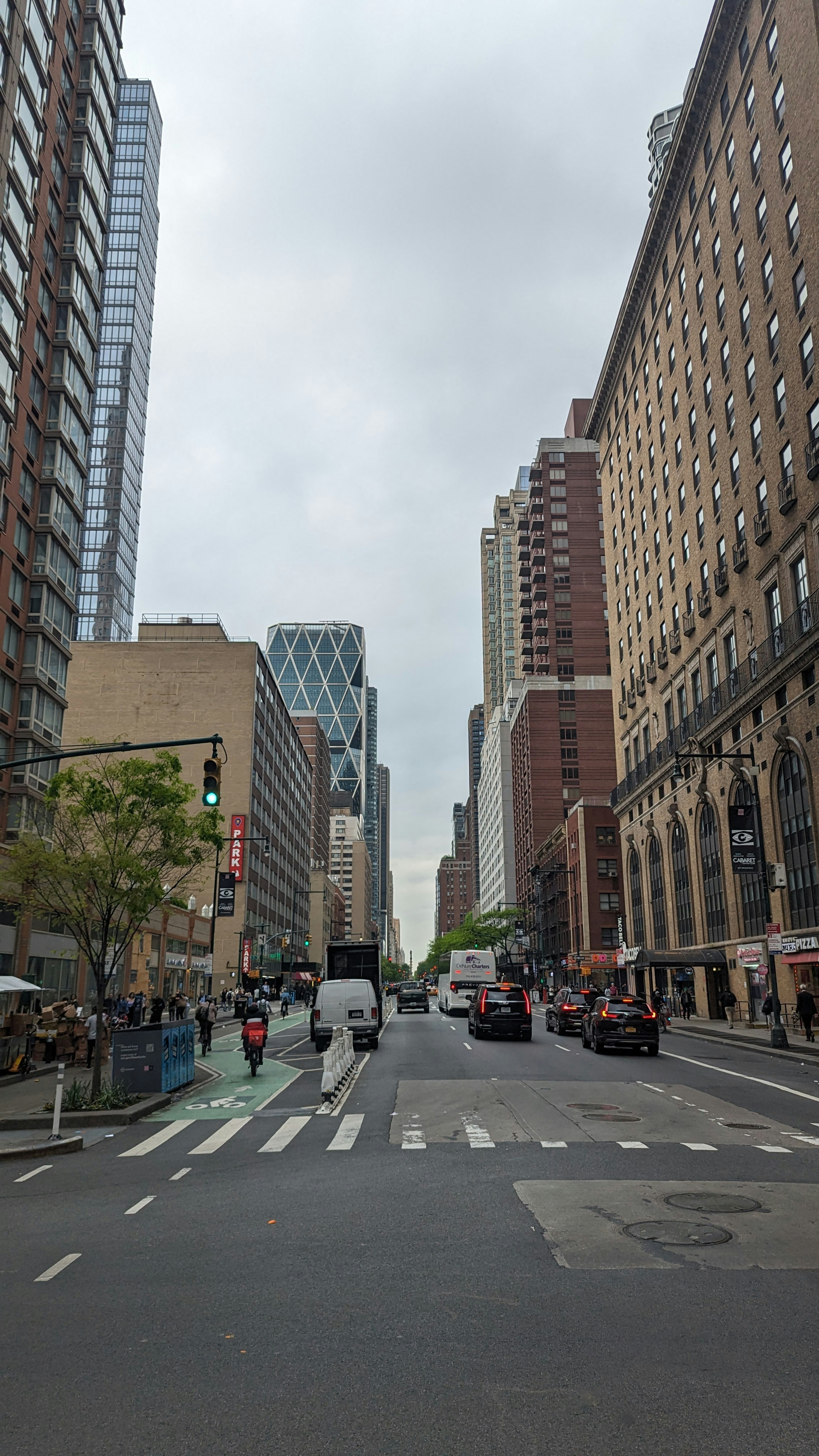 NYC highway congestion with bumper-to-bumper traffic, overcast sky, dark asphalt, low-light urban road setting